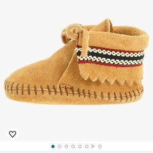 2 Pairs of Minnetonka bootiesOne Tan and One Brown.Infant size Size 6.Never worn